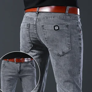 Jeans nuovo stile, vestibilità slim da uomo, comodi pantaloni a vita media grigi elastici a gamba dritta stile coreano, pantaloni casual in denim da uomo 1