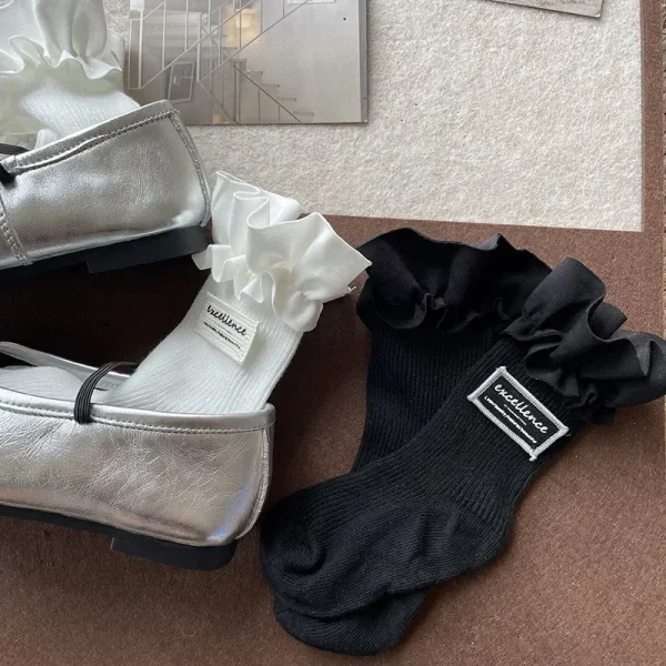 1 paio di calzini al polpaccio per bambini alla moda Semplicity Ins per ragazza Calzini con volant di colore bianco nero per bambini Calzino scolastico primaverile in morbido cotone 5