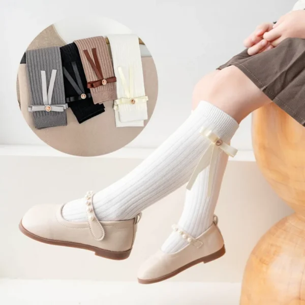 Nuovi calzini a metà polpaccio per ragazze per bambini autunno primavera calze da scuola per bambini in morbido cotone nero bianco calzini con fiocco carino 4