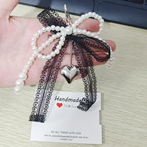 Portachiavi con nodo a farfalla in tessuto di perle bianche Nuova moda carino dolce borsa per telefono per auto portachiavi a catena appesa accessori regalo per amici 1