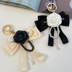 Portachiavi con papillon coreano alla moda con camelia, spilla utilizzata per le donne, decorazione per borse, colletti per camicie, portachiavi accessori di moda perfetti 1
