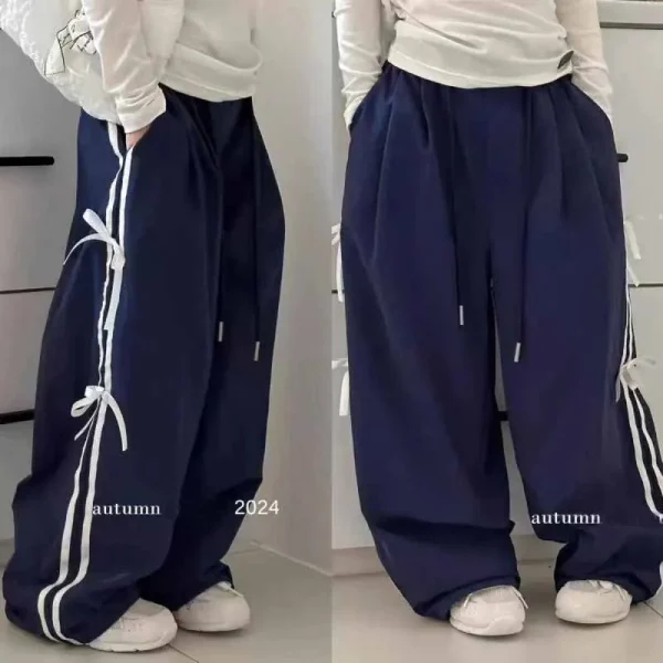 Pantaloni primaverili per ragazze Pantaloni sportivi con papillon per bambini Pantaloni alla moda dolce autunno Nuovi pantaloni casual a righe Biancheria intima allentata per bambini 1