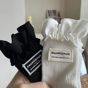 1 paio di calzini al polpaccio per bambini alla moda Semplicity Ins per ragazza Calzini con volant di colore bianco nero per bambini Calzino scolastico primaverile in morbido cotone 1