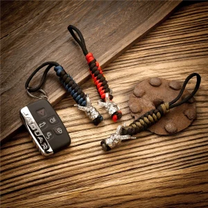 Fascino Mens Weave Rope Hellboy Portachiavi per coltello Borsa Ciondolo Donna Appeso Portachiavi per auto Donna Corda di sopravvivenza all'aperto Gioielli blu scuro 1