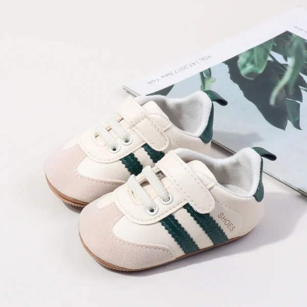 2025 Scarpe da primo camminatore per neonati e ragazze di nuovo stile Suola antiscivolo classica a righe morbida per i più piccoli 5