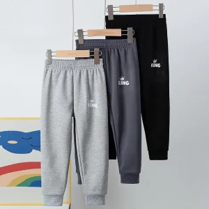 Pantaloni harem stampati con lettera KING semplice in puro colore autunno e inverno per bambini per ragazzi e ragazze, pantaloni Joker sportivi per il tempo libero 1