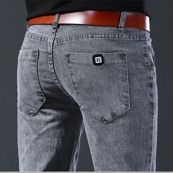 Jeans nuovo stile, vestibilità slim da uomo, comodi pantaloni a vita media grigi elastici a gamba dritta stile coreano, pantaloni casual in denim da uomo 5