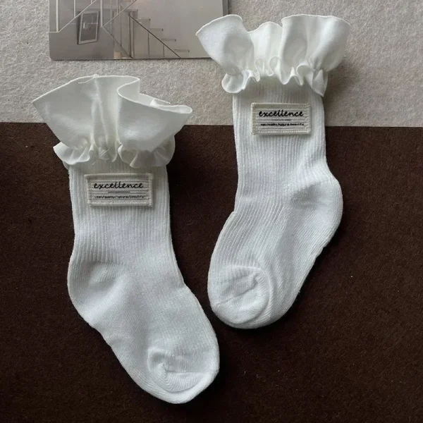 1 paio di calzini al polpaccio per bambini alla moda Semplicity Ins per ragazza Calzini con volant di colore bianco nero per bambini Calzino scolastico primaverile in morbido cotone 6