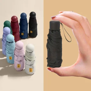 Ombrello pieghevole piccolo Ombrellone da pioggia Mini tasca Ombrellone da viaggio portatile impermeabile anti-UV 1