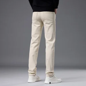 2025 autunno e inverno comodi casual slim fit piccoli jeans a gamba dritta da uomo color albicocca semplici pantaloni elastici versatili 1