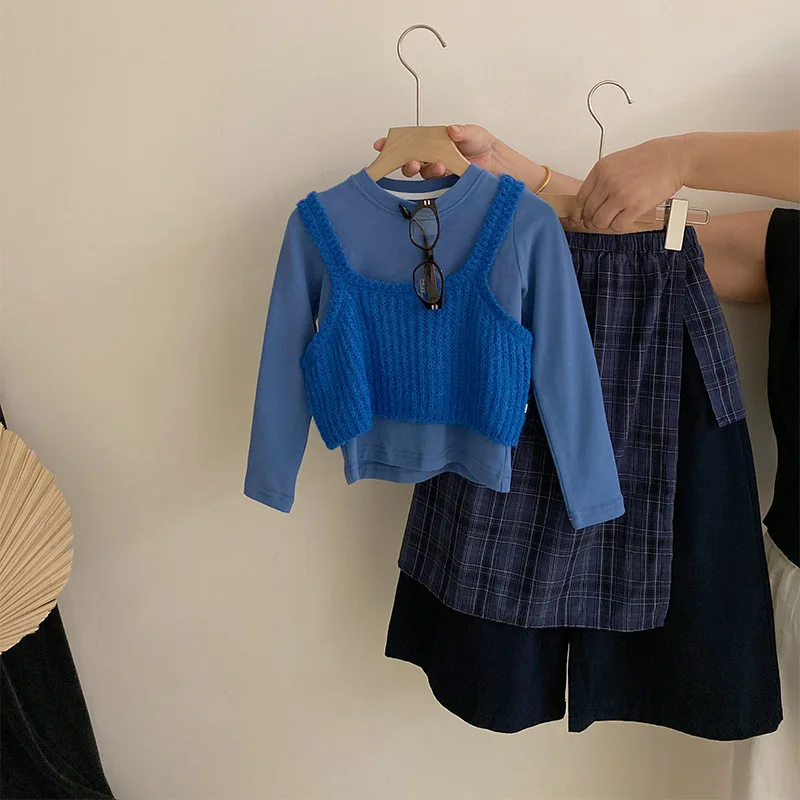 Vestito da ragazza 2025 Autunno e inverno Nuovi vestiti per bambini Ragazza Gilet lavorato a maglia per bambini Tinta unita Top Pantaloni con tenda scoreggia Quattro set 2