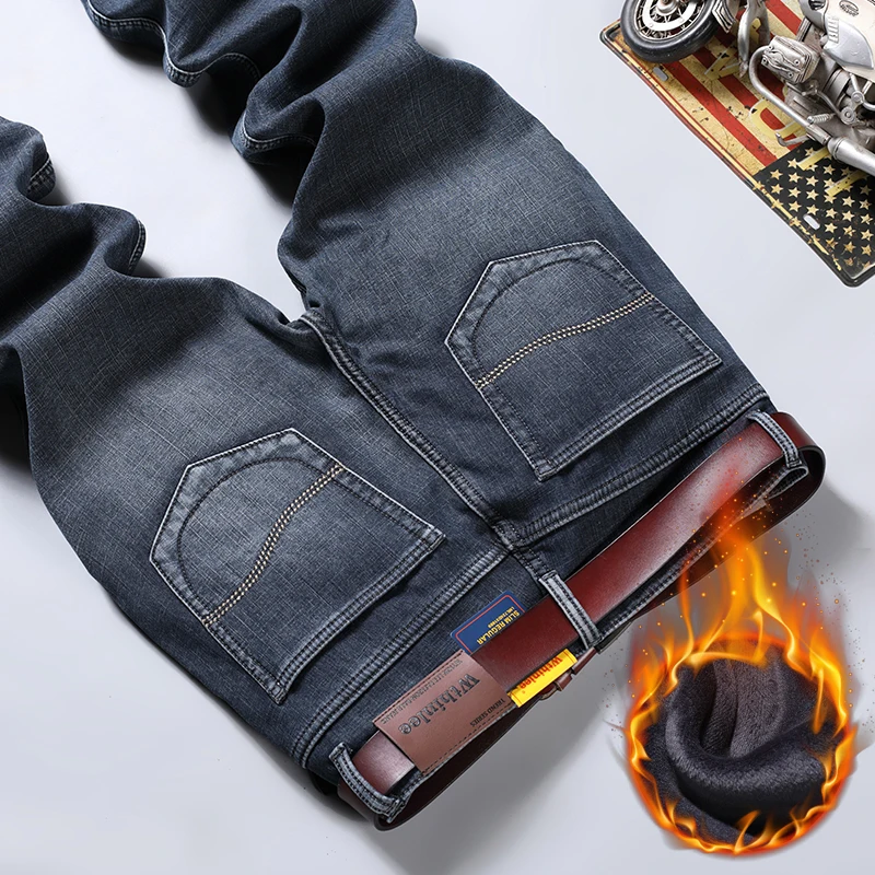2025 Jeans invernali da uomo caldi pantaloni in denim caldi foderati in pile vestibilità dritta pantaloni da cowboy spessi elasticizzati classici da uomo blu da lavoro 3
