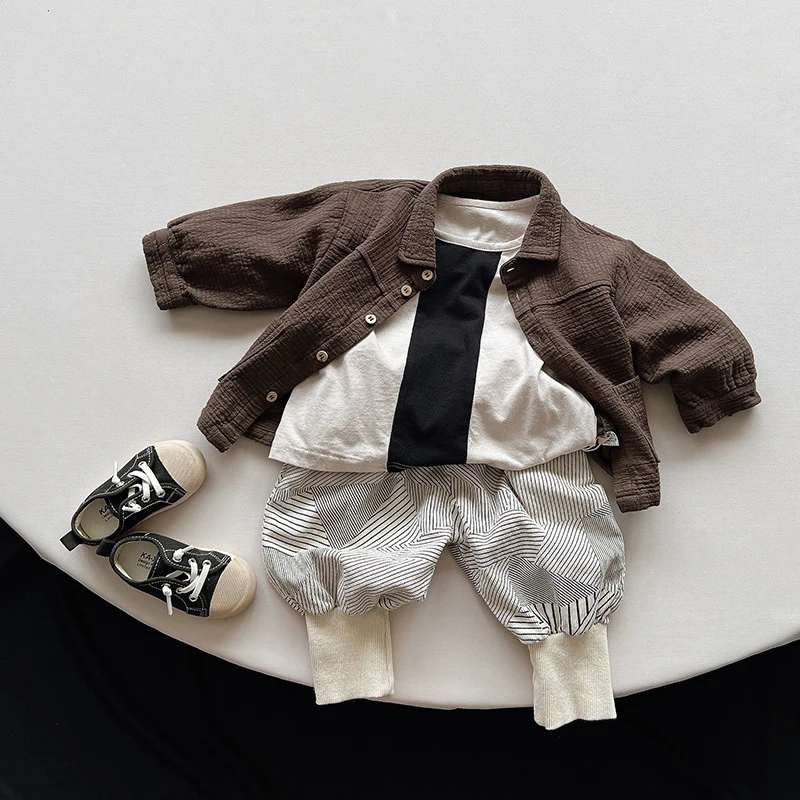 Primavera autunno bambini giacche 1-8Y ragazzi cotone tasca con bottoni Solid cappotti quotidiani coreano bambino capispalla abbigliamento per bambini 2024 nuovo 2