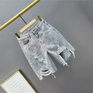 Jeans denim strappati europei 2025 estate nuovi jeans a cinque punti dimagranti larghi a vita alta slim e pesanti 1