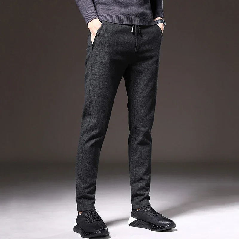 Pantaloni da ufficio termici da uomo autunno inverno pantaloni dritti a gamba stretta classici pantaloni casual con coulisse design allacciato pantaloni in pile addensati 4