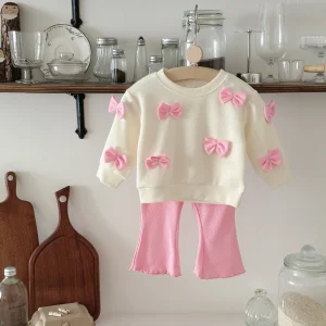 Set di vestiti per bambini primavera autunno Completo per neonato Top a maniche lunghe con fiocco + Pantaloni svasati rosa carini Set alla moda per neonati 1