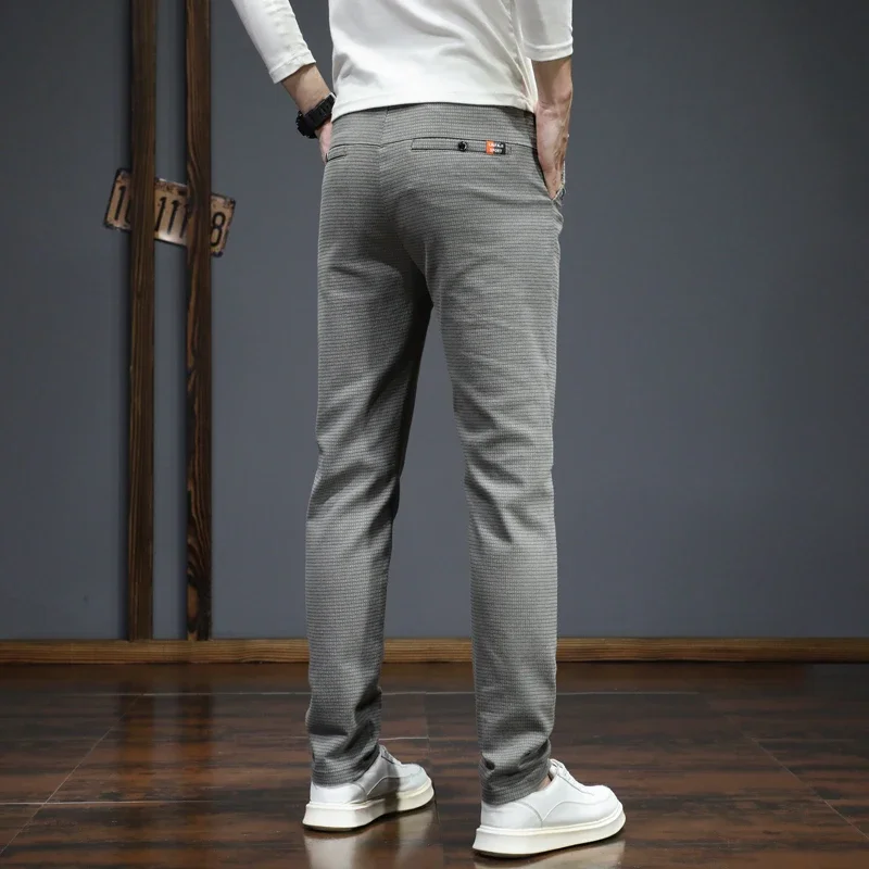 Pantaloni casual da uomo nuovi autunno inverno moda coreana pantaloni slim fit dritti elasticizzati pantaloni sportivi di alta qualità tinta unita maschile 4