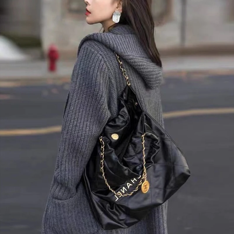 Cappotto maglione medio-lungo da donna con tasca casual grigia coreana autunno inverno Cappotto semplice nuovo versatile ed elegante cardigan lavorato a maglia 6