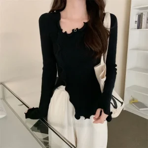 Maglione lavorato a maglia slim fit da donna con scollo a V senza maniche Top irregolare con bordo in legno Design Camicia base per abbigliamento interno all'inizio della primavera 1