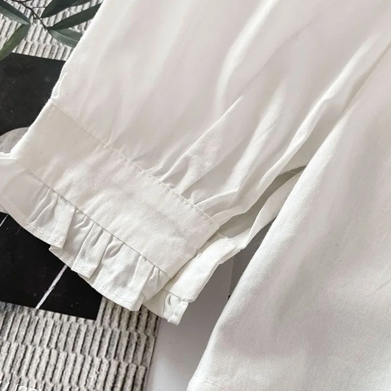 Camicia bianca con colletto alla Peter Pan stile preppy Donna Primavera Estate Manica lunga Camicette casual allentate per studenti Camicie abbottonate Kawaii 5