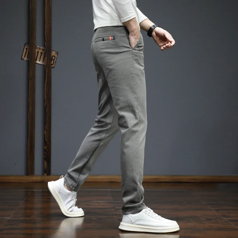 Pantaloni casual da uomo nuovi autunno inverno moda coreana pantaloni slim fit dritti elasticizzati pantaloni sportivi di alta qualità tinta unita maschile 3