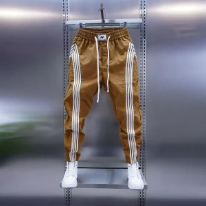 Pantaloni sportivi a righe alla moda pantaloni casual da jogging all'aperto pantaloni sportivi sottili ad asciugatura rapida abbigliamento da uomo di marca di lusso 1
