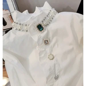 2024 Camicie da donna Camicetta vintage francese Camicia con bottoni primaverili Colletto a punta Manica lunga a sbuffo Top bianco sottile perlato 1