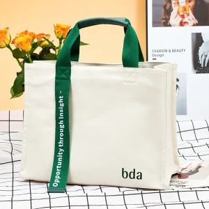 Borsa tote in tela di cotone portatile con logo stampato personalizzato da 100 pezzi popolare per donna 1