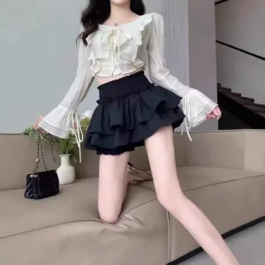 Minigonna soffice a vita alta per donna Primavera Estate Nuovo stile Prevenire l'esposizione Gonna corta Balletto Hot Girl Forma di torta 1