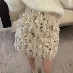 2023 Gonna di piume con paillettes di design originale per le donne Elegante gonna corta di lusso stile chic in tweed ispirata alla moda 1