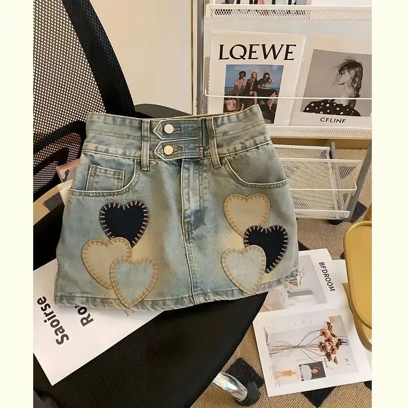 2025 Estate Nuova moda coreana Patchwork Vita alta Gonna a trapezio Tendenza femminile Tasca sexy Denim Gonna corta Abbigliamento donna Gonne 1