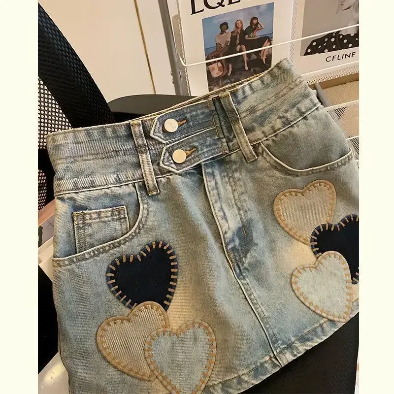 2025 Estate Nuova moda coreana Patchwork Vita alta Gonna a trapezio Tendenza femminile Tasca sexy Denim Gonna corta Abbigliamento donna Gonne 3