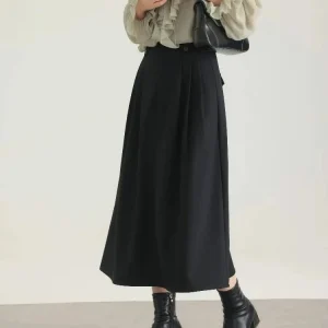 Gonna longuette elegante a vita alta Gonna svasata a pieghe da donna Gonna a linea morbida in tessuto spazzolato Gonna nera adatta per l'uso quotidiano in ufficio primaverile 1