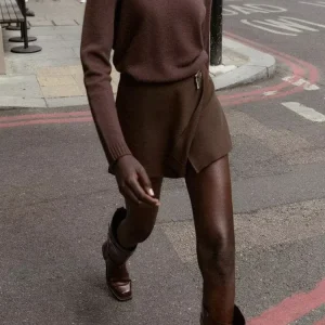 Stile europeo e americano autunno nuove donne abbigliamento temperamento semplice sottile vita alta pantaloni gonna asimmetrica alla moda 1