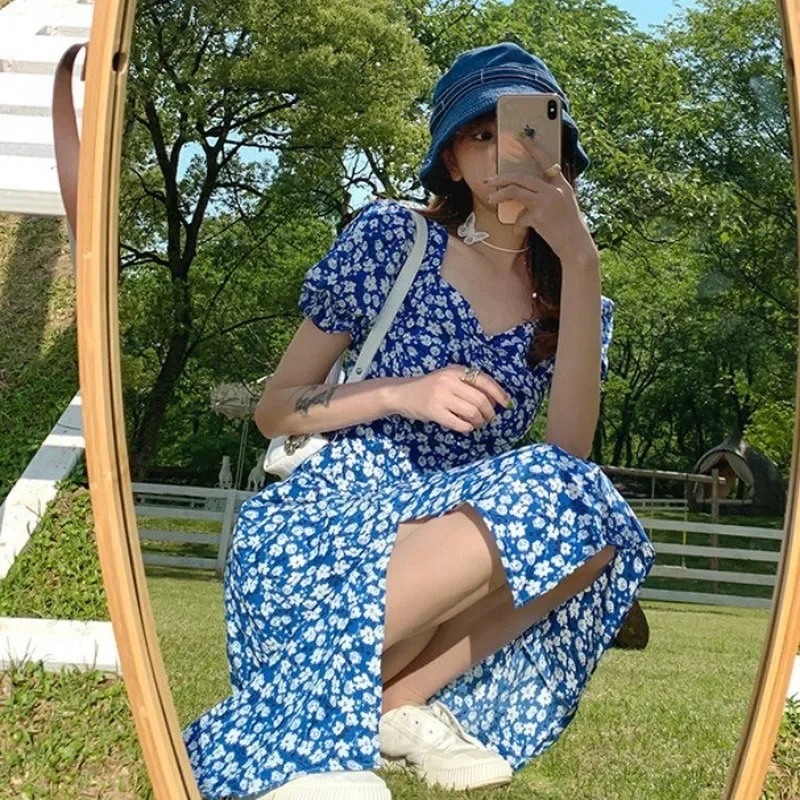 Vendita calda estiva della stagione Abito lungo diviso floreale in stile francese Dimagrante stile sorella Dente di leone Abito da donna in fibra di poliestere 1