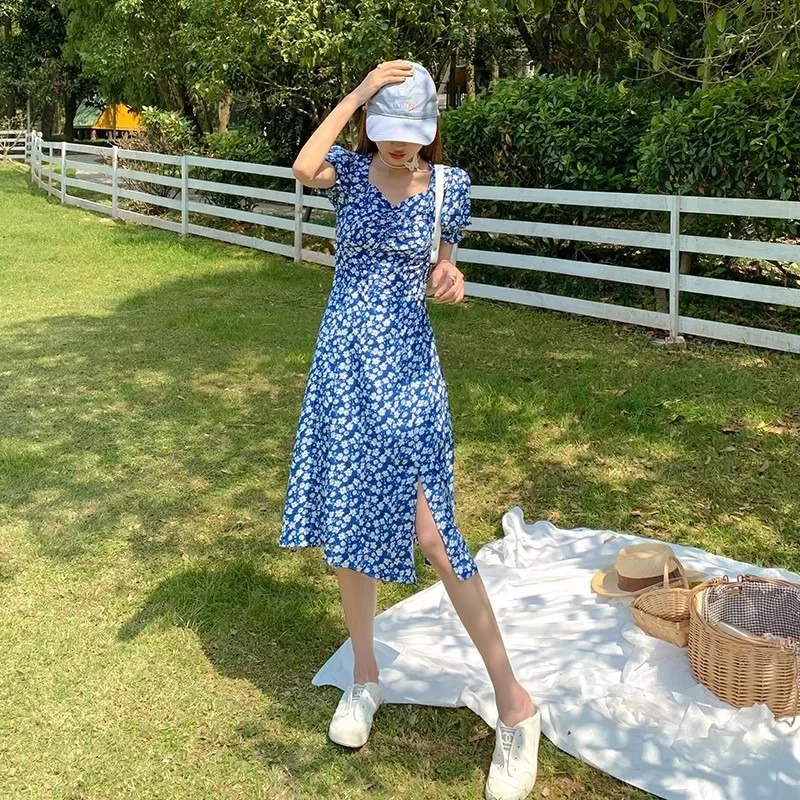 Vendita calda estiva della stagione Abito lungo diviso floreale in stile francese Dimagrante stile sorella Dente di leone Abito da donna in fibra di poliestere 3