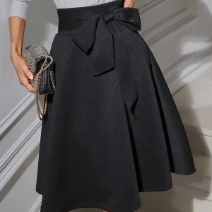 Fairyshely Gonna nera lavorata a maglia casual Donna 2025 Gonna estiva con lacci a vita alta al ginocchio Gonna elegante a pieghe con linea A solida 1