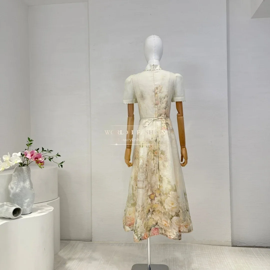 Autunno 2026 nuove donne in stile casual che indossano abito longuette con perline a maniche corte con stampa di rose beige Vendita calda 2