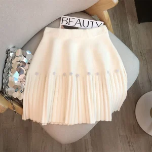 Dolce perla fiore decorare minigonna donna autunno inverno gonne a pieghe a vita alta lavorate a maglia gonne a trapezio coreane chic femminili 1