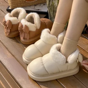 Stivaletti caldi carini Scarpe invernali da donna con fiocco caldo in peluche con fiocco in cotone 2025 Nuovi stivali da neve a botte corta in tessuto impermeabile 1