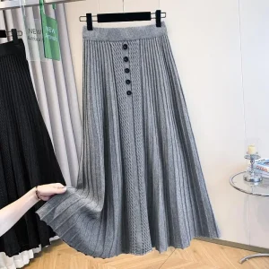 2025 Autunno Inverno New Office Lady Semplicità Elastico in vita Gonna a trapezio Moda donna Bottoni larghi Gonna a pieghe tinta unita 1