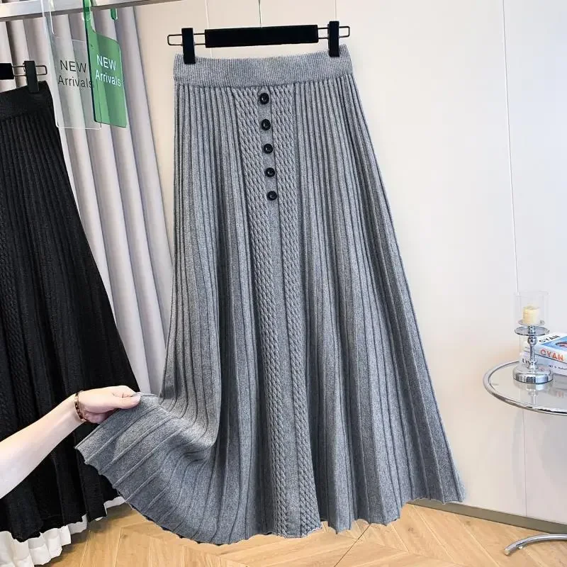 2025 Autunno Inverno New Office Lady Semplicità Elastico in vita Gonna a trapezio Moda donna Bottoni larghi Gonna a pieghe tinta unita 1