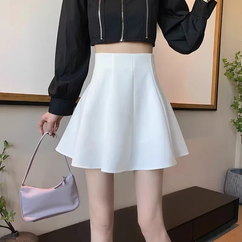 Gonna nera donna primavera 2024 nuovo Mini abito gonna ombrello gonfio alla moda gonna A trapezio dimagrante A vita alta 3