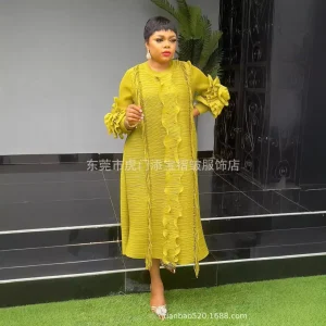 Abito plissettato stile Miyake Donna 2025 Nuovo colore solido Fiore a manovella Perline laser e bordi densi Abito elegante di grandi dimensioni 1