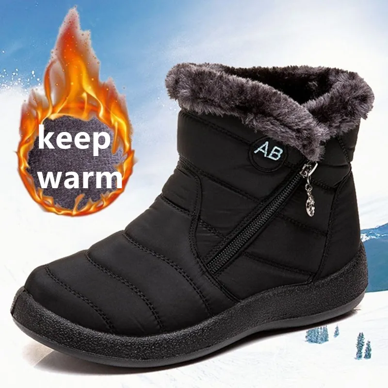 Nuove scarpe da donna di grandi dimensioni autunnali e invernali, foderate in pile per il calore, stivali da neve con suola morbida per donna, inverno addensato 1