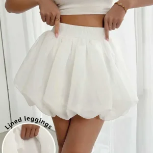 Gonna corta da donna in tinta unita per la primavera e l'estate, casual e versatile. 1