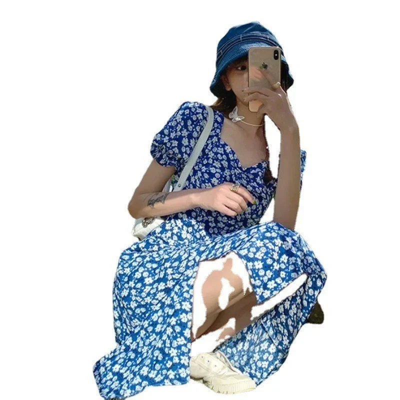 Vendita calda estiva della stagione Abito lungo diviso floreale in stile francese Dimagrante stile sorella Dente di leone Abito da donna in fibra di poliestere 4