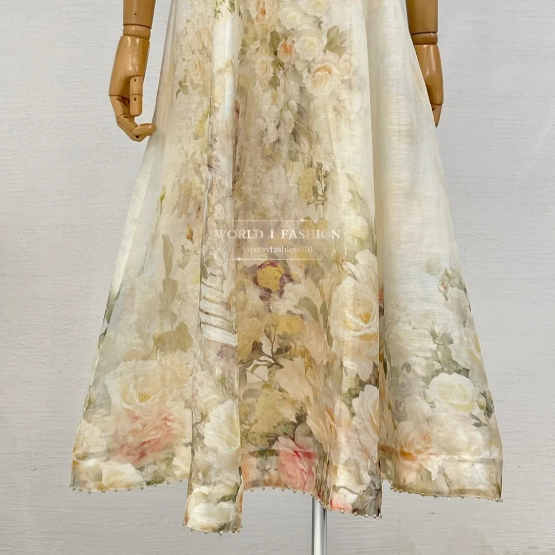 Autunno 2026 nuove donne in stile casual che indossano abito longuette con perline a maniche corte con stampa di rose beige Vendita calda 5