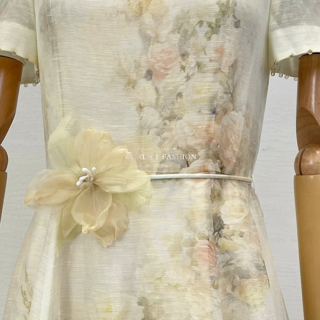 Autunno 2026 nuove donne in stile casual che indossano abito longuette con perline a maniche corte con stampa di rose beige Vendita calda 6