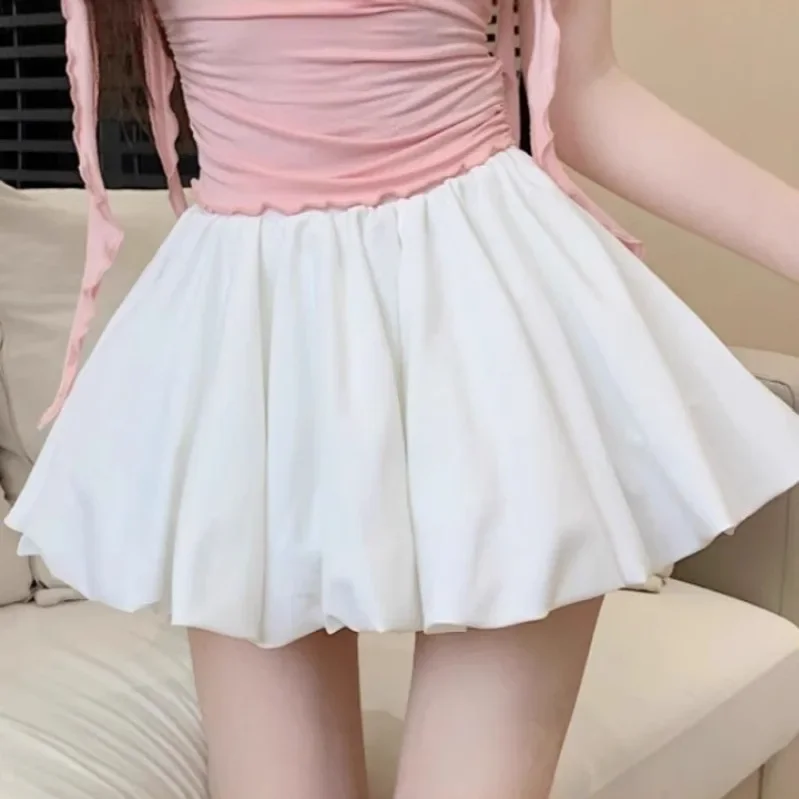 Minigonna bianca a linea A Gonne svasate primavera estate da donna Vita alta dimagrante Gonne tinta unita in fibra di poliestere anti-luce 2